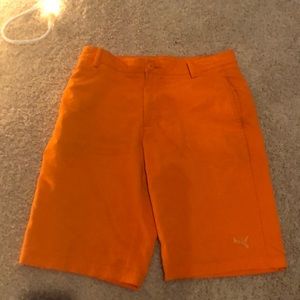 Orange puma shorts
